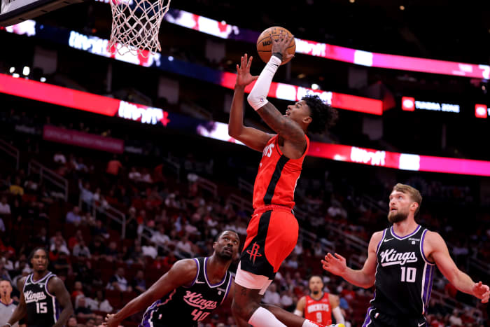 Rockets guard Jalen Green makes a layup against the Sacramento Kings during the first quarter at Toyota Center.